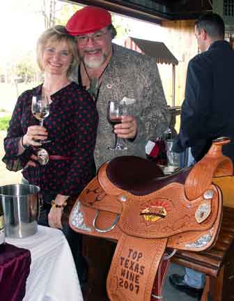 Paul & Merrill with Houston Rodeo Competition Wine Award Saddle